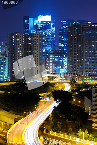 Image of highway and traffic in city at night