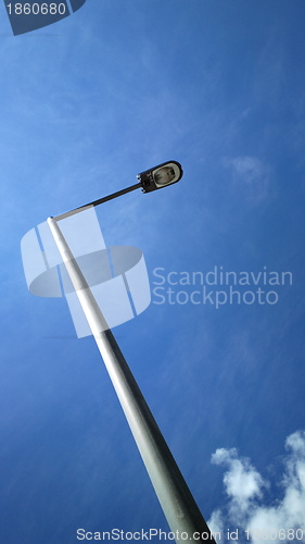 Image of street light with blue sky