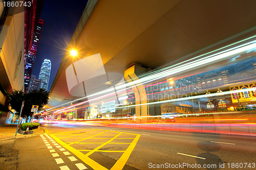 Image of city in night with busy traffic