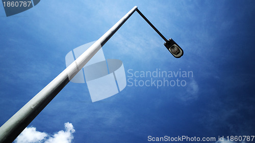 Image of street light with blue sky