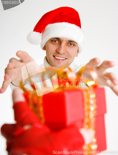 Image of young man in a Santa hat