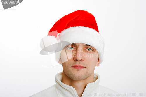 Image of young man in Santa hat