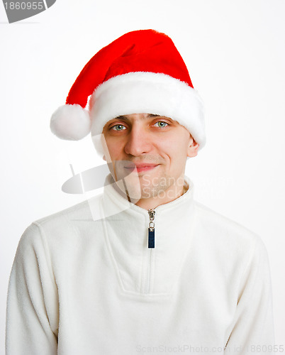 Image of young man in Santa hat