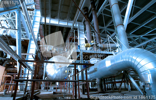 Image of Industrial zone, Steel pipelines in blue tones  