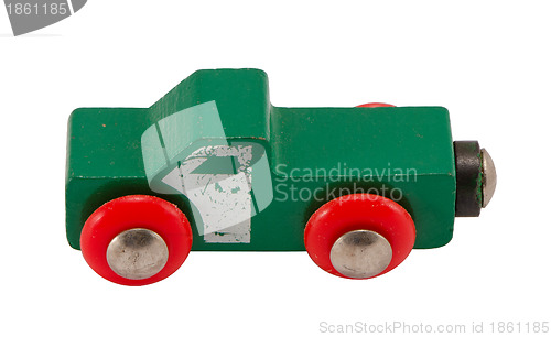 Image of Wooden green retro toy car isolated on white 
