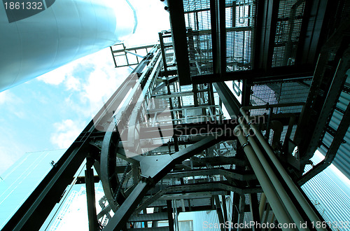 Image of Industrial zone, Steel pipelines and cables in blue tones  