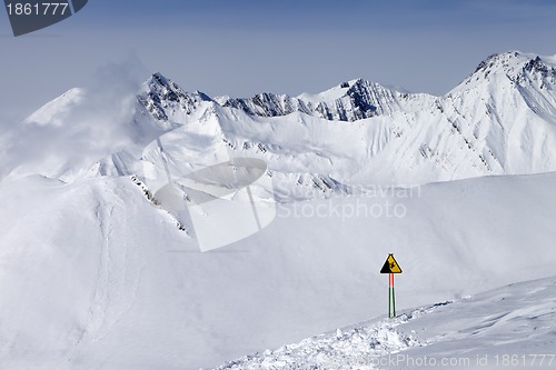 Image of Warning sing on ski slope
