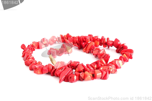 Image of coral beads over white