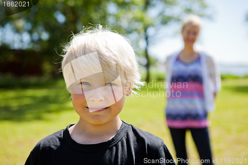 Image of Boy and mother outdoors