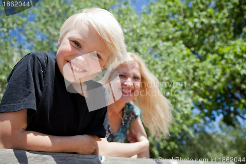 Image of Boy and mother outdoors