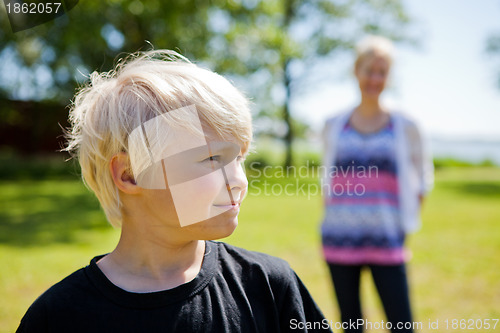 Image of Boy and mother outdoors