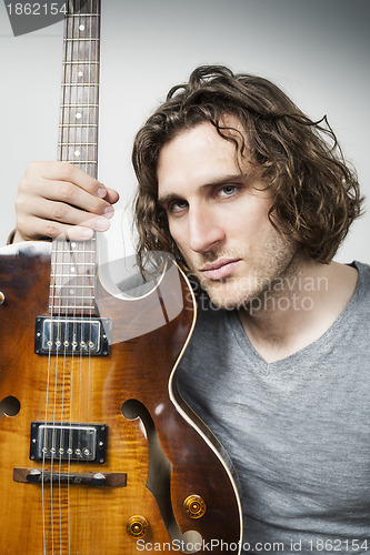 Image of man with guitar