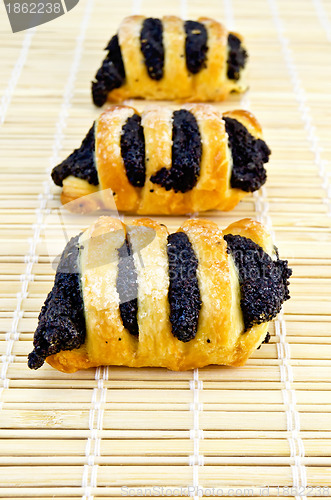 Image of Biscuits with poppy seeds on a bamboo napkin