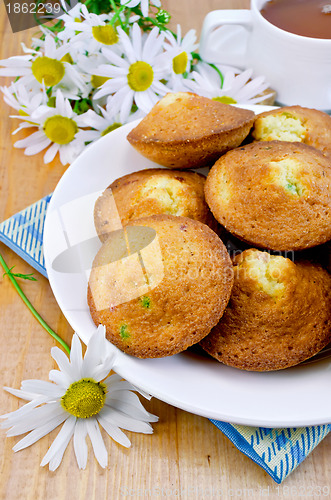 Image of Biscuits with tea and camomiles