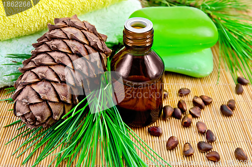 Image of Oil cedar with pine cones and soap