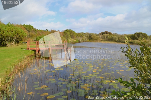 Image of pier on a lake