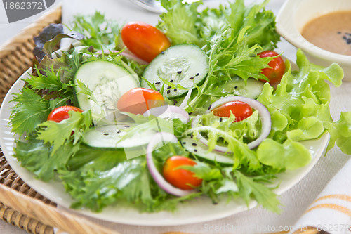 Image of Healthy salad with sesame dressing
