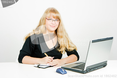 Image of blonde girl with a laptop