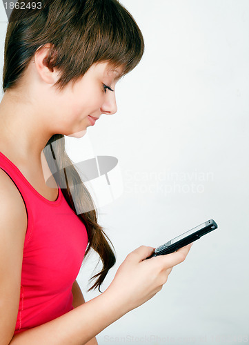 Image of teen girl with a mobile phone
