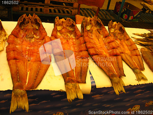 Image of The dried and cut marine fish is on sale