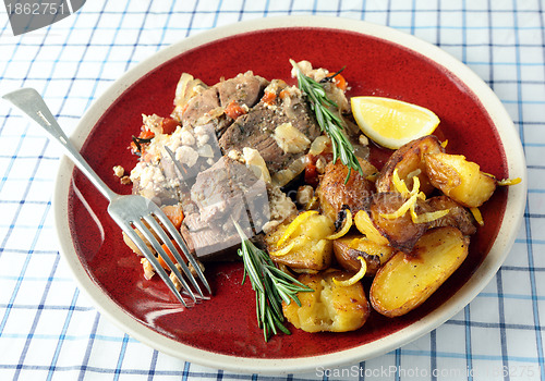 Image of Kleftiko and lemon roast potatoes