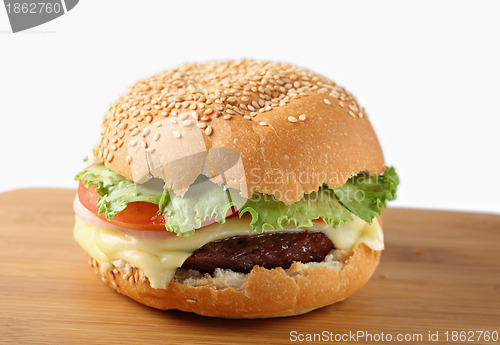 Image of Cheeseburger on a board
