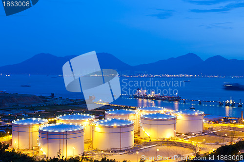 Image of Oil tanks at night