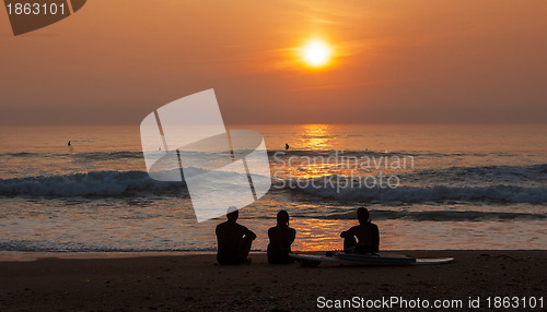 Image of Surfers Admiring the Sunset