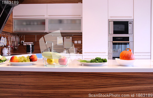 Image of Fruit and vegetables in the well designed modern kitchen 