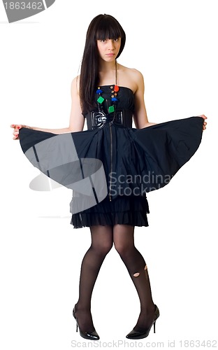 Image of Young woman in torn stockings