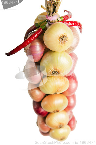 Image of Sheaf of an onions, it is isolated on white