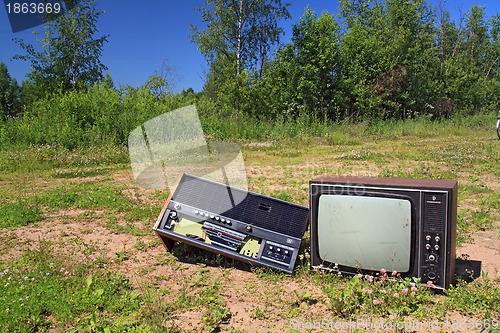 Image of old radio on rural road