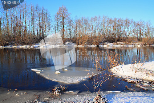 Image of white ice on autumn river