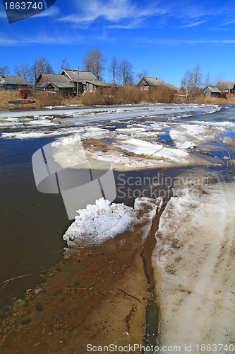 Image of village on coast autumn river