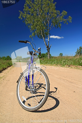 Image of bicycle on sandy rural road