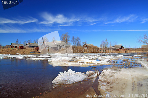 Image of village on coast autumn river