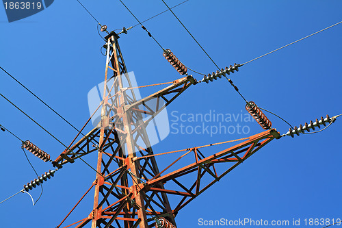 Image of electric pole on blue background