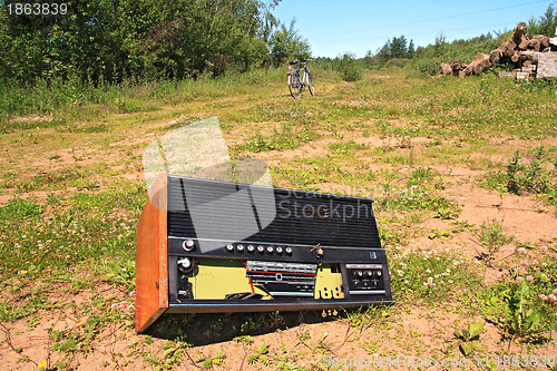 Image of old radio on rural road