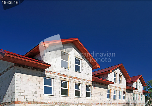 Image of new cottage on celestial background