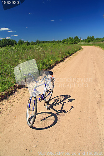 Image of bicycle on sandy rural road