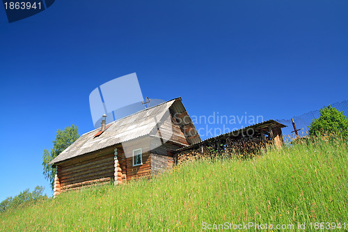 Image of rural house not low hill