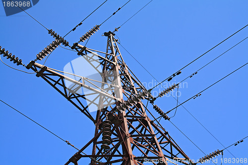 Image of electric pole on blue background