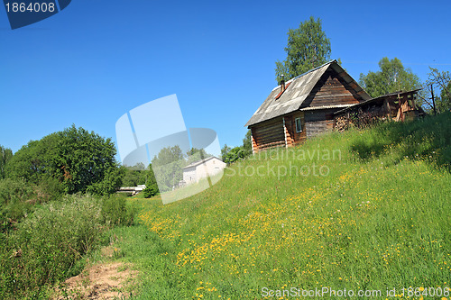 Image of rural house not low hill