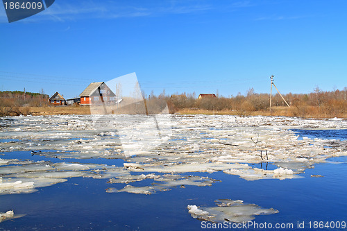 Image of rural house on river coast