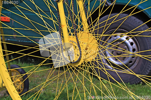 Image of yellow bicycle wheel