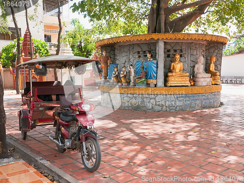 Image of Tuk-tuk taxi at temple in Phnom Penh