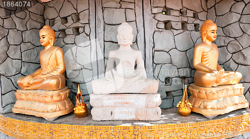 Image of 3 Buddha images in Phnom Penh, Cambodia