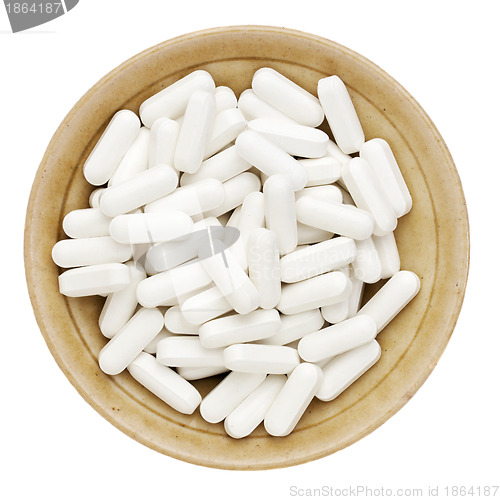 Image of white vitamin pills