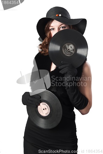 Image of Pretty girl holding vinyl disc