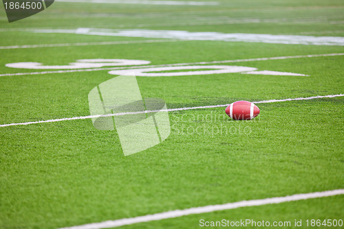 Image of Football on Stadium Field